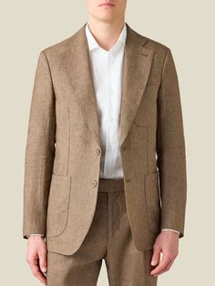 Crafted in Northern Italy from 100% pure linen, treated to obtain a unique natural stretch for breathability and comfort. Designed with a single-breasted 2-button closure, fine sartorial details and a tailored profile for an elegant look.     Cut in a slim yet comfortable fit, this elegant suit jacket has an unstructured profile and is half lined for lightness and a relaxed appeal. Artisanal details like AMF stitching and sartorial details like the notch lapel and patch pockets make this blazer Timeless Linen Blazer With Lapel Collar, Classic Linen Blazer With Pockets, Luxury Linen Single Breasted Blazer, Classic Linen Suits For Workwear, Luxury Single Breasted Linen Blazer, Timeless Linen Blazer For Business, Timeless Beige Linen Suit, Linen Blazer With Notch Lapel And Welt Pockets, Business Casual Linen Blazer With Concealed Placket