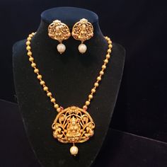 "Handmade Indian Temple Jewelry, best to wear it for traditional ceremonies or Indian wedding. This bridal jewelry has ethnic finish. It has Cubic Zircon stones with ruby and emeralds. It is a Bollywood style one gram jewelry. There are long and short patterns of Indian jewelry in Kundan, Pearls, CZ, American Diamond , ruby, emerald, Polki, kemp to suit every occasion of South Indian and North Indian weddings. Handmade Indian Jewelry item * Stunning Hand made Temple jewelry set. * Necklace Set i Traditional Gold Temple Necklace With Peacock Design, 22k Gold Jewelry With Peacock Design For Festivals, Festival Kundan Temple Necklace With Peacock Design, 22k Gold Peacock Design Jewelry For Puja, Diwali Kundan Temple Necklace With Peacock Design, Festive Temple Necklace With Peacock Design, Bollywood Temple Necklace With Peacock Design For Diwali, Bollywood Style Temple Necklace With Peacock Design For Diwali, Kundan Temple Necklace With Peacock Design For Navratri