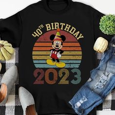 a mickey mouse birthday shirt with the number twenty on it