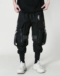 Type: Techwear pants Design: Techwear, streetwear Technical pants: This techwear pants is the perfect garment to complete your Techwear outfit. Premium quality: Reinforced seams, comfortable to wear, soft touch Materials: Polyester Suitable for men and women Machine washable: 30 °C (86 °F) Size(cm | in) Waist Hip Length S 66 | 26 106 | 41.7 94 | 37 M 70 | 27.5 110 | 43.3 96 | 37.8 L 74 | 29.1 114 | 44.8 98 | 38.5 XL 78 | 30.7 118 | 46.5 100 | 39.4 2xL 82 | 32.2 122 | 48 102 | 40.1 Cyberpunk carg Techwear Style Cargo Pants For Streetwear, Winter Functional Cargo Pants For Streetwear, Techwear Sweatpants With Pockets, Techwear Baggy Sweatpants For Streetwear, Baggy Techwear Sweatpants For Streetwear, Black Techwear Parachute Pants For Outdoor Activities, Baggy Techwear Sweatpants, Winter Techwear Parachute Pants For Sports, Techwear Sweatpants With Side Pockets