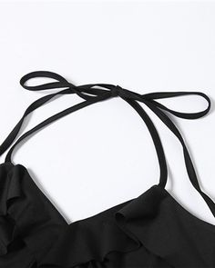 Details: Halter top with side split wing designTop Length: CroppedSleeve Length: SleevelessMaterials:95% Polyester + 5% Spandex Summer Party Tops With Straps, Sleeveless Tie-back Top For Night Out, Sleeveless Tie Back Top For Night Out, Black Halter Neck Top With Tie Back, Black Ruffled Crop Top For Summer, Black Tie Strap Tops For Beach, Ruffled Halter Neck Top For Vacation, Black Tops With Tie Straps For Beach, Black Stretch Top With Tie Back