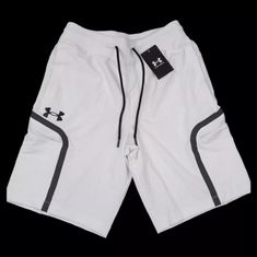 Under Armour Ua Sportsyle Elite Cargo Shorts Men's White Size Us Men's Medium Fitted Fit 9" Inseam White Athletic Shorts With Built-in Shorts For Gym, Functional White Bottoms With Pockets, White Activewear With Built-in Shorts, Functional White Moisture-wicking Athletic Shorts, White Go-dry Athleisure Shorts, Functional White Workout Shorts, White Athleisure Shorts With Go-dry Technology, White Go-dry Sports Shorts, Functional White Athletic Shorts For Workout