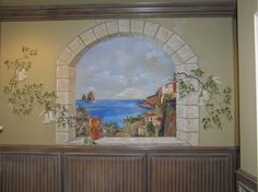 a painting on the side of a wall in a room with wooden paneling and an arched window