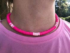 -Hey everyone! Please enjoy these handmade hot pink beaded aloha choker necklaces with pastel pink and white accents! -They are made out of elastic cord and can stretch easily. -These chokers are the perfect gift for friends, family, or loved ones! Cheap Colorful Heishi Bead Necklaces, Adjustable Single Strand Pink Beaded Necklace, Festival Pink Round Beads Choker, Pink Round Beads Choker For Festival, Pink Choker For Summer Festival, Pink Summer Festival Choker, Pink Tiny Beads Jewelry For Vacation, Pink Tiny Beads Vacation Jewelry, Pink Festival Choker With Tiny Beads