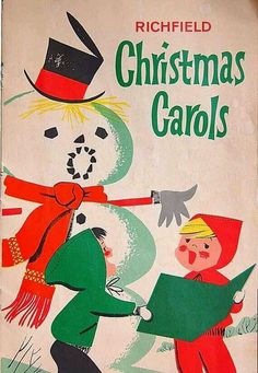 an old children's book with the title christmas carols written in green and red