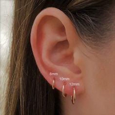 Our non tarnish gold Vermeil sleeper hoops are the perfect everyday addition to your ears! ♥️ Real Gold-Plated Sterling Silver (Vermeil) Hoops ♥️ Hypoallergenic ♥️ The perfect, everyday hoops ♥️ Choose your size ♥️ 1.2mm thickness ♥️ Small and Easy to put in ♥️ Free gift bag included, ready for gifting straightaway  This listing is for 1 hoop earring, if you need a pair please buy 2  For any more questions - please message me x Free Shipping! (UK ONLY) 1st class to UK. Tracked & Signed to International Locations. Please select TRACKED delivery to UK for Guaranteed delivery.  By using the free 1st class large letter postage you are agreeing that I am not responsible for lost items in the post. Please be aware that, unfortunately, I cannot offer refunds for post that is lost in the mail unle Gold Hoops Aesthetic, Sleepers Earrings, Minimalist Ear Piercings, Sleeper Earrings, Small Gold Hoops, Tiny Hoop Earrings, Gold Jewelry Simple, Cartilage Earrings, Gold Hoops