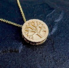 Gold Round Tree of Life Pendant, 14k Yellow Gold. The Tree is a symbol of life and truth. Size: Height: 18 mm Width: 18 mm IMPORTANT: Import duties may apply Notice: Please provide your phone number in the notes section of your order for shipping. White Gold Tree Of Life Jewelry As Gift, Gold Spiritual Jewelry Laser Engraved, Spiritual Gold Jewelry Laser Engraved, Spiritual Gold Laser Engraved Jewelry, Laser Engraved Spiritual Gold Jewelry, Spiritual Laser Engraved Gold Jewelry, Tree Of Life Round Pendant Jewelry For Anniversary, Gold Laser Engraved Jewelry For Anniversary Gift, Gold Laser Engraved Jewelry For Anniversary