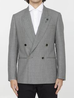 Double-breasted jacket in grey wool. It features peaked lapels, front four-button closure, two front welt pockets, a welt pocket on chest and buttoned cuffs. Regular fit. The model is 184cm tall and wears size IT 48.Size nationality: IT Product number: 37176789 Product code: 690661571901 Composition: 100% WOOL Wool Tuxedo Blazer With Double-breasted Button, Wool Tuxedo Blazer With Double-breasted Fastening, Wool Tuxedo Blazer With Double Button Closure, Double-breasted Wool Tuxedo With Double Button Closure, Wool Tuxedo Outerwear With Double Button Closure, Business Wool Blazer With Double-breasted Button, Wool Double-breasted Business Blazer, Wool Double-breasted Blazer For Business, Classic Double-breasted Tweed Jacket