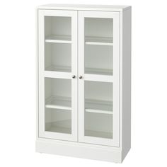 a white cabinet with glass doors on the front and bottom shelves, both closed up