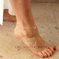 Double Chain Anklet for Women This double chain gold anklet is stylish and os the perfect everyday jewelry.  Includes a top and bottom chain handmade just for you!  D E T A I L S *Includes two layered chains that are connected *14kt Gold-Filled & 18kt gold plated chain -lead, nickel & cadmium free *Heavy plating, tarnish resistant, water friendly How to find your size -Take a string and measure around your ankle where you want the chain to sit -Lay the string on a ruler -Add 1 inch for room HOW Gold Chain Metal Anklet For Gift, Adjustable Metal Anklets With Gold Chain, Elegant Yellow Gold Chain Anklets, Gold Chain Metal Anklet, Great For Gifts, Elegant 14k Gold-filled Gold Anklets, Gold Anklet, Women's Jewelry Sets, Layered Chains, Gem Necklace