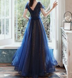 Material: Tulle Color:Navy Blue Hemline:Floor Length  Back Details:Lace-up Dress Number: #G2WS Delivery times: Processing time:    2-3 weeksShipping time:       3-5 working days Rush Order is available, for rush order, the processsing time is only 7-12 working days. Custom Measurements For custom size, please leave us Blue A-line Dress For Prom, Blue A-line Ball Gown For Formal Occasions, Fitted Royal Blue Tulle Evening Dress, Fitted Blue Tulle Ball Gown, Blue Fitted Tulle Dress, Fitted A-line Gown With Tulle Skirt, Blue A-line Tulle Evening Dress, Royal Blue Tulle Dress For Prom, Royal Blue Floor-length Tulle Dress