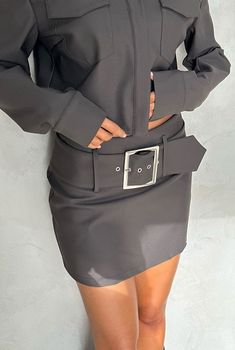 The Lloyd Skirt by Nakedvice is a mid rise mini skirt. Featuring a removable belt with silver buckle, The Lloyd Skirt is the perfect mid-rise mini skirt. Pair with The Lloyd Jacket for a matching set.

Jessica is 171cm and wears a size S. 
 Size: XS, S, M, L, XL, XXL; Colour: MOSS Belted Fitted Mini Skirt, Fitted Mini Skirt With Belt Loops For Fall, Trendy Belted Mini Bottoms, Belted Fitted Mini Skirt Skort, Trendy Mini Length Bottoms With Belt, Trendy Mini Bottoms With Belt, Fitted Mini Skirt Skort With Belt, Fitted Mini Skirt With Belt, Fitted Belted Mini Skort