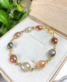 Moonstone Bracelet - Moonstone Jewelry - Multi Color Moonstone - Moonstone Garden Gold Moonstone Gemstone Bracelets, Gold Moonstone Round Bracelets, Gold Moonstone Bracelet With Gemstones, Elegant Moon Phase Bracelet As A Gift, Elegant Moon Phase Bracelet As Gift, Elegant Moon Phase Bracelet For Gift, Elegant Moonstone Gemstone Bracelets, Elegant Moonstone Gemstone Bracelet, Elegant Moonstone Crystal Bracelet For Gift