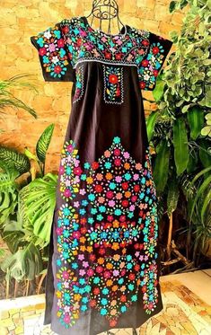 This beautiful floral dress is completely hand embroidered by Mexican artisans, it is ideal for a formal occasion or Bridesmaid in any event, comfortable and beautiful. It has hand embroidered flowers This dress is handmade by Mexican Artisans in Mexico. Note: Since this dress is Hand embroidered the embroidered colors on each dress vary, making them one of a kind. We recommend washing by hand with cold water, tender in the shade, to better preserve the original color Cheap Traditional Embroidered Dress, Traditional Mexican Dress Long, Embroidered Mexican Flower Catrina Gowns, Affordable Traditional Embroidered Dress, Mexican Dresses Traditional Long, Old Mexican Dresses, Mexican Style Dresses, Fabric Blanket, Blanket Fabric