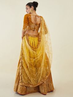 Introducing the captivating yellow sequins art silk haldi wear lehenga choli, a stunning ensemble that exudes elegance and charm. Crafted with precision and adorned with intricate details, this lehenga choli is perfect for special occasions such as receptions, weddings, festivals, and functions like haldi.
Made from high-quality yellow-color art silk material, this lehenga features exquisite sequin work and zari embroidery on a shaded fabric, adding a touch of glamour and sophistication. The mat Yellow Mirror Work Sets For Reception, Yellow Bollywood Sharara With Sequins, Bollywood Style Yellow Sharara With Sequins, Yellow Sets With Mirror Work For Reception, Bollywood Yellow Sequin Set, Yellow Anarkali Choli With Sequins, Yellow Anarkali Set With Sequins, Gold Sequined Lehenga For Diwali, Yellow Sequined Lehenga For Diwali