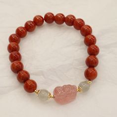 Style: Original Design Material: South Red Color: 8mm Natural South Red Strawberry Quartz Pi Xiu Bracelet Fashion Element: Color Matching, Three-Dimensional Decoration Snowflake Bracelet, Copper Coin, Circle Bracelet, Copper Coins, Emerald Bead, Garnet Bracelet, Aquamarine Crystal, Red Bracelets, Red Strawberry