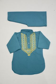 Description Colour: Teal Fabric: 100% Cotton Dress Front: Embroidery  This is a handmade outfit for infant, toddler and kid boys. It includes a top and bottom with machine embroidery front. It would be an ideal outfit for occasions such as birthdays, Eid and Weddings or a perfect gift. Available in sizes:  *3-6 months *6-9 months *12-18 months (1-1.5 years old) *18-24 months (1.5-2 years old) Top / Kurta  *Breathable and easy-to-wash cotton fabric *Easy open and close clasp-buttons *No-itch coll Green Straight Kurta Set With Embroidered Border, Straight Kurta Sets In Mulmul With Embroidered Border, Mulmul Sets With Straight Kurta And Embroidered Border, Blue Mulmul Kurta With Zari Work, Blue Mulmul Kurta With Resham Embroidery, Mulmul Sets With Embroidered Border And Straight Kurta, Blue Cotton Sherwani With Dabka Work, Blue Sets With Chikankari Embroidery For Transitional Season, Bollywood Style Cotton Sherwani With Multicolor Embroidery