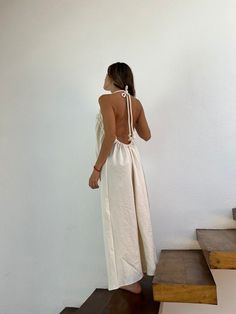 ALLE BOHO "TESSY" Beach Maxi Dress, features "V" shape front and backless self-tie, and artisanal fabric, wear it as a bikini cover-up, or for an evening event. This maxi dress is everything that you want for your next vacation. We are proud to make Artisanal Clothing using only RAW Cotton that feels and looks very basic and natural. Our clothes not only look natural and beautiful but are also made in the most natural and beautiful way. Details: One Shoulder Dress See tie with a braided cotton l Backless Maxi Dress For Brunch During Beach Season, White Bohemian Backless Maxi Dress, White Backless Bohemian Maxi Dress, Chic White Backless Vacation Dress, Chic White Backless Dress For Vacation, Beige Sleeveless Backless Beach Dress, Summer Maxi Dress With Low Back And Back Opening, White Backless Maxi Dress For Beach, Chic Backless Dress For Beach Season