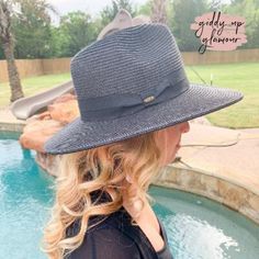 We love lounging on the beach or by a pool, but we also love to take care of our pretty skin. This adorable hat is sure to have you covered this summer! The cute C.C. hat will match perfect with anything and also offers UV protection of UPF 50+. The hat is adjustable and measures 24 inches around the crown. Brim measures 3.5 inches wide. SKU: #0218-2071 Uv Protection Panama Hat With Short Brim, Trendy Flat Brim Beach Hat, Chic Sun Hat With Uv Protection And Short Brim, Lightweight Hats For Poolside And Beach Season, Lightweight Beachy Hat For Sunbathing, Chic Short Brim Sun Hat With Uv Protection, Chic Short Brim Sun Hat For Vacation, Chic Adjustable Hats With Upf 50+, Trendy Flat Brim Sun Hat For Beach