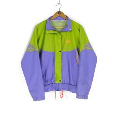 Welcome to our shop. We are waiting for your wishes, also don't be afraid to ask any questions. If you like something from our clothes, just add  to favourites or write to us. Follow us on instagram - @cashalot.store  - ITEM -  80s 90s rare Vintage men's NIKE multicolor green purple track jacket Size M retro sportswear rave style made in Thailand - SIZE - Size Label (M)  Pit - to - Pit - 25,6 (65cm) Sleeve from neck - 30,3 (77cm) Length - 25,2 (64cm) (all our items are measured laying flat) - CONDITION -  Total condition 8/10 Please check all Photos , also i can make detailed photos All needed questions ask before buying! - DELIVERY INFO - * All the parcels have a tracking number * All the items will be shipped after successful payment transaction within 1-3 business days. * International Green Track Jacket For Streetwear Athleisure, 90s Style Streetwear Track Jacket For Spring, Sporty Purple Track Jacket For Streetwear, Retro Green Track Jacket For Streetwear, Multicolor Track Jacket For Streetwear, 90s Green Windbreaker For Streetwear, 90s Multicolor Track Jacket For Streetwear, Casual Purple Track Jacket For Streetwear, 90s Green Sports Outerwear