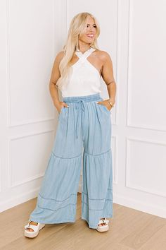 - Embrace effortless style and ultimate comfort with our relaxed chambray pants. Featuring a trendy wide-leg cut, these pants offer a chic, flowy silhouette that is perfect for any casual outing. Made from soft, breathable chambray fabric, these pants are your go-to choice for a stylish yet relaxed look. - Unlined material - A scratchy elastic waistband with a functional drawstring - Functional side pockets - A relaxed silhouette that ends in wide hemlines Chambray Pants, Chambray Fabric, Chambray, Effortless Style, High Waist, Wide Leg, High Waisted, Elastic, Clothes For Women