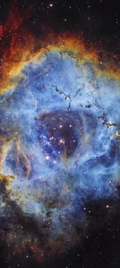 an image of a very large blue star in the middle of some space with stars all around it