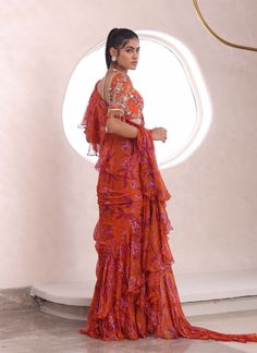 Mahima Mahajan | Syra Orange Draped Sari And Blouse | INDIASPOPUP.COM Pre Draped Saree, Mahima Mahajan, Orange Drapes, Lehenga Style Saree, Indian Bridesmaid Dresses, Draped Saree, Blouse With Ruffles, Ruffle Saree, Lehenga Style