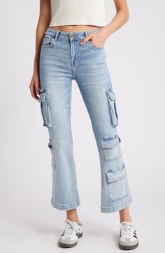 A modern cropped-flare silhouette brings a fresh look to stretchy cargo jeans equipped with plenty of pockets. 25" inseam; 10 1/2" front rise Zip fly with button closure Five-pocket style; side flap-patch pockets 93% cotton, 5% polyester, 2% spandex Machine wash, tumble dry Imported Spring Mid-rise Utility Flare Jeans, Flared Cropped Jeans With Pockets, High Rise Flare Jeans With Multiple Pockets For Spring, Spring High Rise Flare Jeans With Multiple Pockets, Light Wash Mid-rise Utility Flare Jeans, Trendy Fall Flare Jeans With Cargo Pockets, Spring Straight-leg Flare Jeans With Multiple Pockets, Spring Straight Leg Flare Jeans, Spring Flare Jeans With Multiple Pockets