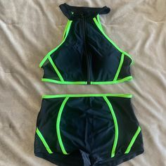 Shein Swimsuit. Black And Neon Green. Halter Top/Shorts Bottoms. Never Worn. Size Small Black Swimwear With Built-in Shorts For Summer, Black Short Swimwear, Black Short Summer Swimwear, Black Short Tankini For Beach, Black Short Length Tankini For Summer, Black Short-length Tankini For Summer, Fitted Black Shorts For Poolside, Black Summer Tankini With Built-in Shorts, Fitted Green Swimwear With Shorts