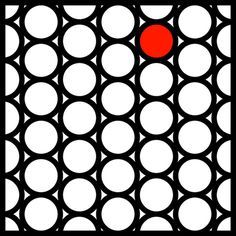 a red dot is in the middle of a black and white pattern with circles on it