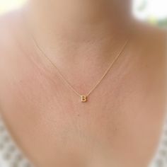 Gold Initial Necklace - make someone happy with this cute simple initial necklace. Sooo sweet! tiny little gold filled letter bead on 14k gold filled dainty chain.It is so cute! you will definitely love it :)A petite tiny 5 mm gold filled letter bead necklace.Simple, beautiful and chic jewelry.Necklace Measures Approximately 17"Please specify your letter If you would like this chain altered, please convo me. All my jewelry are packed in an elegant gift box.If you want to give it as a gift you can specify the address and I'll be happy to send it on your behalf. Simple Tiny Initial Pendant Charm Necklaces, Simple Tiny Initial Pendant Charm Necklace, Simple Tiny Initial Pendant Jewelry, Simple Tiny Initial Pendant Necklace, Dainty Initial Necklace In Yellow Gold For Birthday, Simple Initial Pendant Charm Necklaces, Simple Name Necklace With Delicate Chain, Dainty 14k Gold Filled Initial Necklace Gift, Dainty Initial Necklace For Birthday