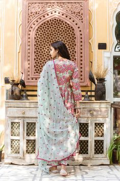 The set consists of printed anarkali kurta with lace detailing on the edges teamed with printed pants and a dupatta with embroidery detailing.The entire set has beautiful lace detailing. Kurta Length-48 inches Palazzo Length-38 inches Dupatta Length-2.5 meters Work-Print Detailing Color-Pink & Light Blue Kurta Fabric-Cotton Bottom Fabric-Cotton Dupatta Fabric-Cotton Model Size- 5.8 tall wearing small size Sleeves - 3/4th Sleeves Neck-Round neck Washing Care-Hand wash or Dry Clean Anarkali Chanderi Palazzo Set With Embroidered Border, Multicolor Anarkali Set With Printed Motifs For Navratri, Chanderi Anarkali Set With Embroidered Border, Green Anarkali Palazzo Set With Embroidered Border, Bollywood Style Multicolor Printed Anarkali Set, Pink Embroidered Border Palazzo Set For Navratri, Navratri Pink Palazzo Set With Embroidered Border, Navratri Pink Embroidered Palazzo Set, Designer Anarkali Set With Multicolor Printed Motifs