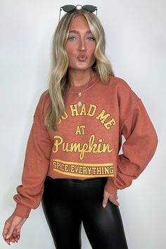 Details: Indulge in cozy comfort with our Pumpkin Spice Everything Graphic Pullover. Made from garment-dyed fabric, this long sleeve sweatshirt boasts an oversized fit and features the playful phrase "You Had Me At Pumpkin Spice Everything". Perfect for any fall enthusiast, you won't be able to resist snuggling up in this top. (Pumpkin spice latte not included.) - "You Had Me at Pumpkin Spice Everything" graphic - Long sleeves Content: 50% COTTON 50% POLYESTER Size + Fit Model is 5'4" and wearin Fall Sweater With Letter Print And Long Sleeves, Long Sleeve Sweater With Letter Print For Fall, Fall Long Sleeve Soft-washed Sweater, Trendy Soft-washed Sweatshirt For Fall, Vintage Fall Sweater With Letter Print, Fall Sweater With Letter Print And Relaxed Fit, Relaxed Fit Sweater With Letter Print For Fall, Vintage Letter Print Sweater For Fall, Relaxed Fit Letter Print Fall Sweater