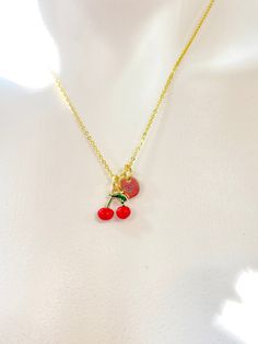 This is gold tone red cherry charm with hand stamped initial charm on brass/stainless steel 18 inches chain. ♥ You will receive 1 necklace. HOW TO ORDER 1) Select the quantity 2) Select the initial  3) Add to cart DESCRIPTION ♥ Necklace, Gold Plated over Brass or Stainless-steel Cable Chain with Lobster Claw Clasp, Size: about 17.7 inches (45cm) long, 1-2mm wide, Nickel Safe, ♥ Initial Charms, Gold Plated over Stainless steel, Size: about 8-10mm in diameter, 1mm thick, Nickel Safe, ♥ Cherry Charm, Brass Enamel Charms, Imitation Fruit, Light Gold, Cherry Charm, Red, Size: about 0.45 inch(11.5mm) wide, 0.47 inch(12mm) long, 0.20 inch(5mm) thick, ♥ We are happy to help with any situation so please reach out with any concerns. ♥ Materials from the USA and international sourcing. ♥ I do not inc Red Dangle Charm Necklaces, Cute Red Charm Necklace For Gift, Cute Red Charm Necklaces For Gifts, Red Dangle Charm Necklaces With Lobster Clasp, Cute Handmade Red Charm Necklaces, Red Charm Necklace With Lobster Clasp, Cute Red Handmade Charm Necklace, Cute Handmade Red Charm Necklace, Personalized Red Dangle Jewelry