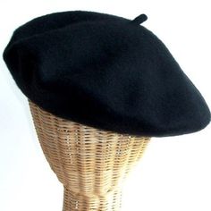 This comfortable and stylish classic French wool beret is available in black or red (each sold separately). It measures approximately 11" in diameter across the top. Perfect for artists, 80's and 90's looks, mimes, clowns, spirit day, dance routines, everyday fashion and other characters for Halloween, parties, theatrical productions, cosplay and more! Other costumes and accessories are sold separately on our page – subject to availability. One size fits larger children, teens or adults. Retro Brimmed Winter Beret, Winter Retro Brimmed Beret, Classic One-size-fits-most Beret, Retro Black Beret For Winter, Classic Spring Beret, Casual Black Beret For Winter, Black Beret With Short Brim For Fall, Vintage Black Beret For Fall, Classic Beret For Winter