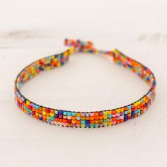 Adjustable Tiny Beads Wrap Bracelet Gift, Colorful Adjustable Round Bead Jewelry, Multicolor Tiny Beads Wrap Bracelet For Friendship, Colorful Adjustable Round Bead Bracelets, Colorful Adjustable Bracelets With Round Beads, Multicolor Tiny Beads Braided Bracelets For Friendship, Colorful Adjustable Beaded Bangle Bracelet, Adjustable Colorful Beads Wrap Bracelet, Multicolor Braided Bracelets With Tiny Beads For Friendship