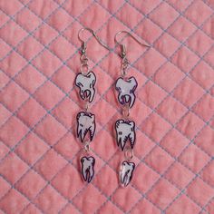 Hand drawn teeth illustrations on shrink dink plastic. Shrinky Sink Earring, Wierdcore Earrings, Weird Jewelry Aesthetic, Pop Tab Earrings, Shrinkie Dink Ideas, Shrink Art Earrings, Shrink Plastic Christmas, Shrinking Plastic Earrings, Shrinky Dink Earrings Diy