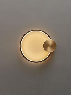 a light that is on the side of a wall with it's lights on