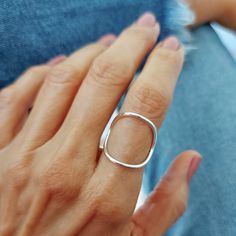 This ring is becoming my favorite very quickly! This minimalist large circle ring design goes well with everything I wear and has that effortless chic look. It is very comfortable to wear as it hugs your index finger in a very delicate and soft way. The width of the circle is about 1 inch. If you need a smaller circle, please contact me and I will be happy to make it for you. I let the smooth finish of the natural sterling silver shine and just hammered the band which is a bit thinner that the c Modern Nickel Free Stackable Rings, Everyday Minimalist Hammered Midi Rings, Nickel-free Minimalist Midi Rings, Modern Nickel-free Open Midi Rings, Silver Hammered Minimalist Midi Rings, Modern Open Circle Midi Rings For Gifts, Modern Open Circle Midi Rings As Gift, Modern Handmade Stackable Rings For Everyday, Minimalist Open Circle Ring For Everyday