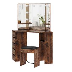 a wooden vanity table with a mirror and stool in front of it on a white background