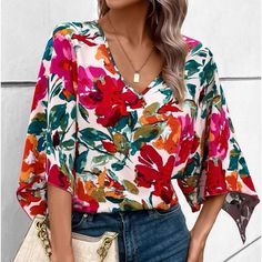 Red Printed V-neck Shirt, Spring Floral Print V-neck Shirt, Spring V-neck Shirt For Brunch, Trendy Floral Print V-neck Tops, Red V-neck Tops For Brunch, V-neck Printed Tops For Brunch, Printed V-neck Top For Brunch, V-neck Floral Print Relaxed Fit Shirt, Chic Printed V-neck Shirt