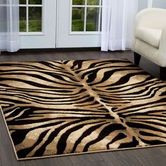 a zebra print area rug in a living room