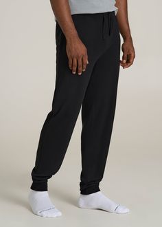 Upgrade Your Loungewear Game Tall Men's Jogger Pants That Fit Just Right Take your loungewear to the next level with our Waffle-Knit Lounge Jogger for tall men. These extra-long men's joggers offer a regular fit with a mid-rise that sits comfortably, and the drawstring waist ensures a secure fit. Side seam pockets add practicality to this essential home wear piece. Perfect for relaxing at home or running errands, these tall joggers combine comfort and functionality tailored for your taller frame Scrubs Dress, Cozy Sleepwear, Mens Jogger Pants, Fall Denim, Sports Blazer, Long Sleeve Tee Shirts, Athletic Pants, Mens Joggers, Suit Shop