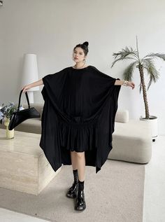 High Street Style Pleated Irregular Hem Batwing Sleeve Dress Black Asymmetrical Long Sleeve Dress For Summer, Black Long Sleeve Asymmetrical Dress For Summer, Casual Black Irregular Dress, Casual Black Asymmetrical Dress, Black Knee-length Asymmetrical Dress For Fall, Casual Black Dress With Batwing Sleeves, Casual Black Batwing Sleeve Dress, Black Asymmetrical Knee-length Dress For Fall, Casual Black Asymmetrical Hem Dress