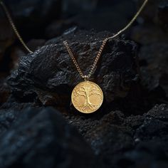 Discover our unique tree of life pendant, a timeless symbol of spirituality and interconnectedness. This pendant is a fine representation of spiritual symbolism and natural beauty. PENDANT INFORMATIONThis pendant is made of real, solid gold.• Made in USA• Material: 14k or 18k solid gold• Finish: polished• Height: 1.1" (28,5 cm) | *includes the small circle, bail dimensions not included• Width: 1" (26 mm)• Pendant weight: approx. 6 grams (14k)• Bail: fits up to 4 mm chains• Solid back, not hollow Yellow Gold Tree Of Life Pendant Jewelry, Sterling Silver Yellow Gold Tree Of Life Necklace, Yellow Gold Sterling Silver Tree Of Life Necklace, Symbolic Gold Jewelry With Tree Of Life, Symbolic Tree Of Life Round Pendant Jewelry, Tree Of Life Round Pendant Jewelry Gift, Tree Of Life Pendant Necklace As Gift, Symbolic Sterling Silver Tree Of Life Jewelry, Symbolic Tree Of Life Sterling Silver Jewelry