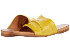 Miz Mooz Aria - Women's Shoes : Yellow : Make the Miz Mooz Aria your go-to sandal this season! It features an asymmetrical body with a cushioned footbed- ideal for all day wear! Slip on style. Round open toe. Rubber sole. Leather upper. Leather lining and insole. Synthetic outsole. Made in Portugal. Measurements: Weight: 7 oz Product measurements were taken using size 9, width B - Medium. Please note that measurements may vary by size. Weight of footwear is based on a single item, not a pair. Summer Vacation Footbed Sandals With Arch Support, Summer Slip-on Mules With Arch Support, Beach Slides With Ortholite Insole And Open Toe, Summer Footbed Sandals With Arch Support And Flat Heel, Summer Flat Heel Footbed Sandals With Arch Support, Beach Footbed Sandals With Arch Support And Flat Heel, Beach Footbed Sandals With Arch Support, Flat Heel Footbed Sandals With Arch Support For Summer, Open Toe Sandals With Arch Support For Summer