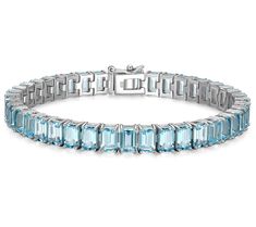 Elevate your elegance game with the Affinity Gems blue topaz tennis bracelet. This stunning piece features octagonal blue topaz stones in a classic design, perfect for adding a touch of sophistication and vibrant color to any outfit. From Affinity Gems. Blue Topaz Stone, Gold Jewelry Fashion, Tennis Bracelet, Blue Topaz, Classic Design, Topaz, Gold Jewelry, Jewelry Bracelets, Tennis