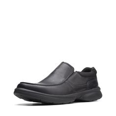 PRICES MAY VARY. Versatile slip-on Bradley Free pairs a black tumbled leather upper with a lightweight sneaker-style sole Premium tumbled black leather upper Ultimate Comfort OrthoLite footbed delivers breathable cushioningSlip-on style offers easy on/offLightweight and shock-absorbing EVA sole Shoe Image, Sneaker Style, Lightweight Sneakers, Free Shoes, Wicks, Pharmacy Gifts, Slip Ons, Arch Support, Loafer Shoes