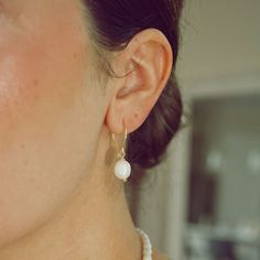 Introducing The Pearl Earrings: the perfect blend of classic elegance and timeless style. Made of 14k gold filled and freshwater pearls, these hoop earrings are guaranteed to add a touch of sophistication to any outfit. Perfect for brides, bridesmaids, or anyone looking to achieve a classy look. Light-weight design. These earrings won't irritate your ears. Handmade in the USASold in pairDETAILSWater Resistant- Tarnish-free- Hypoallergenic Material: 14k Gold filled, Natural freshwater pearls Hoop 40th Gifts, Beaded Cuff, The Pearl, Chain Choker, Cuff Bangles, How To Look Classy, Classic Elegance, Beaded Chain, Timeless Style