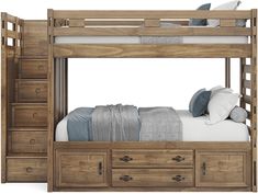 a wooden bunk bed with drawers underneath it